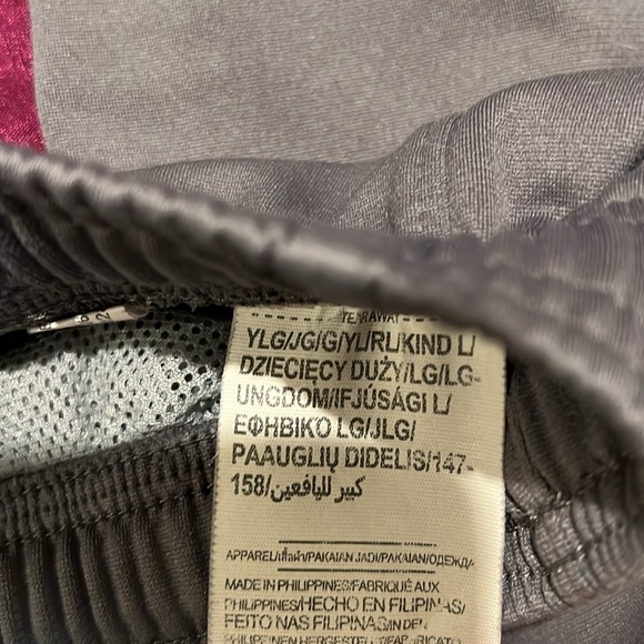 Two pairs under armour boy brawler pants. Size L - Picture 2 of 2